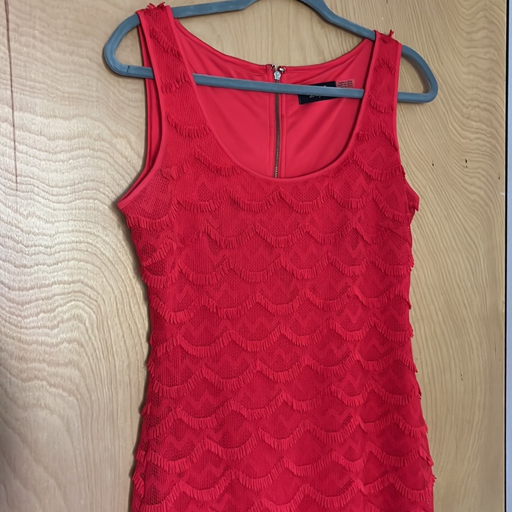GUESS Fun dress above knee! Slight fringe design. Looks stunning on. Scoop neck